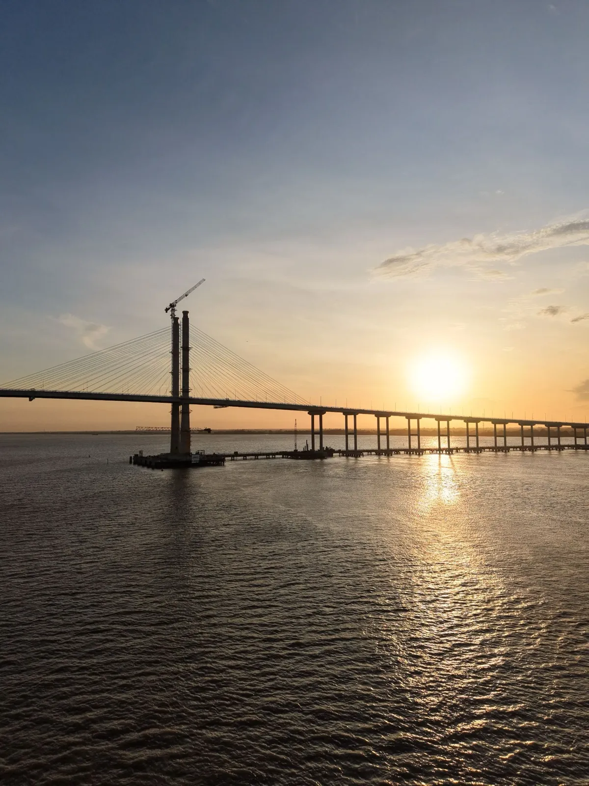 The new Demerara Harbour Bridge at sunset, the four-lane cable-stayed crossing linking Georgetown and the West Demerara