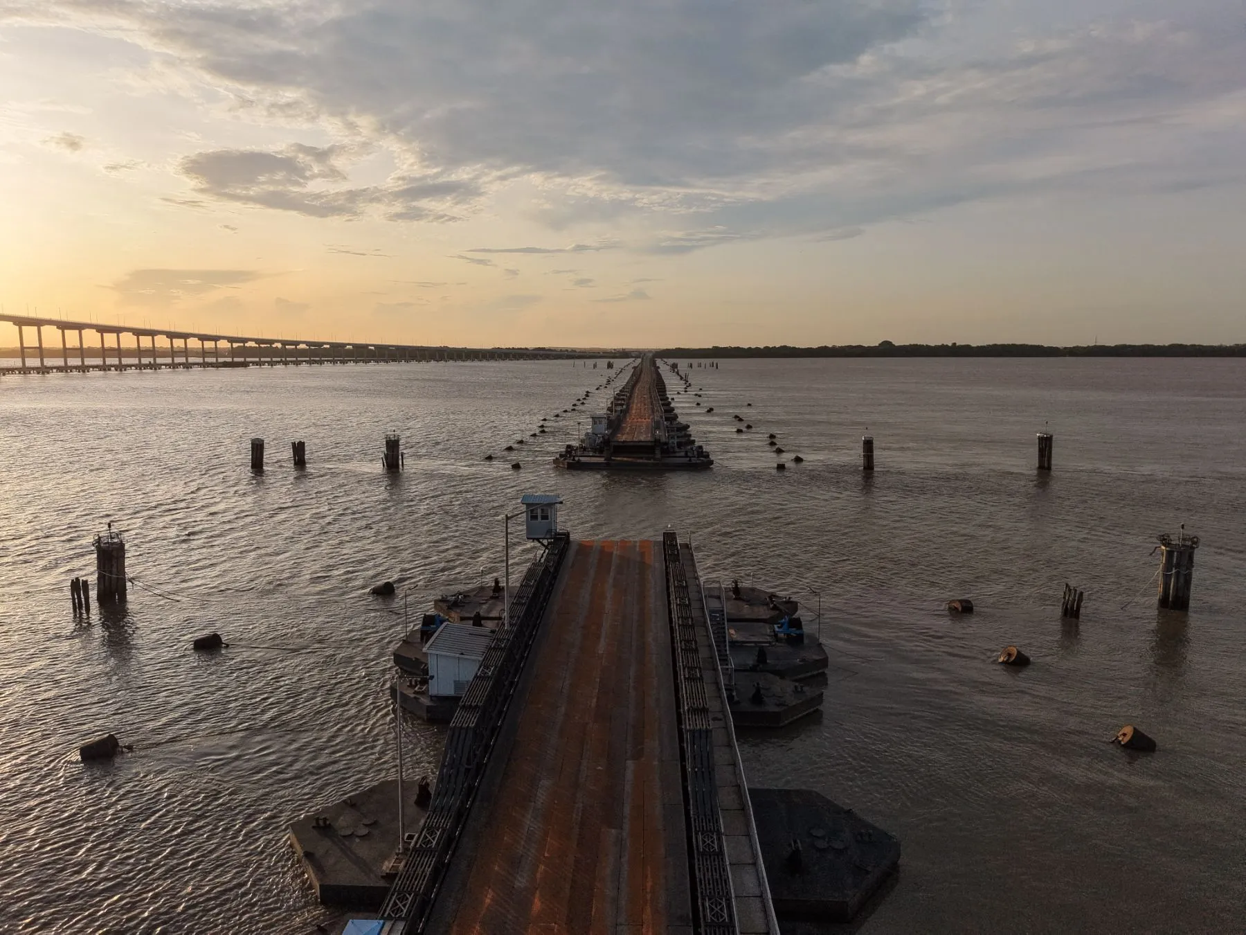 The original Demerara pontoon bridge at sunset in Georgetown, Guyana — a local landmark serving the GuyWay support community
