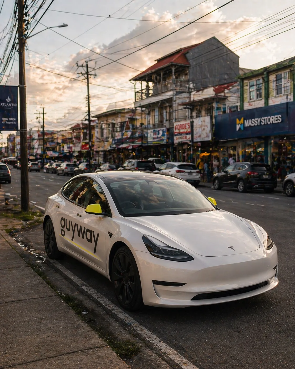A GuyWay Tesla at dusk in a residential Georgetown district