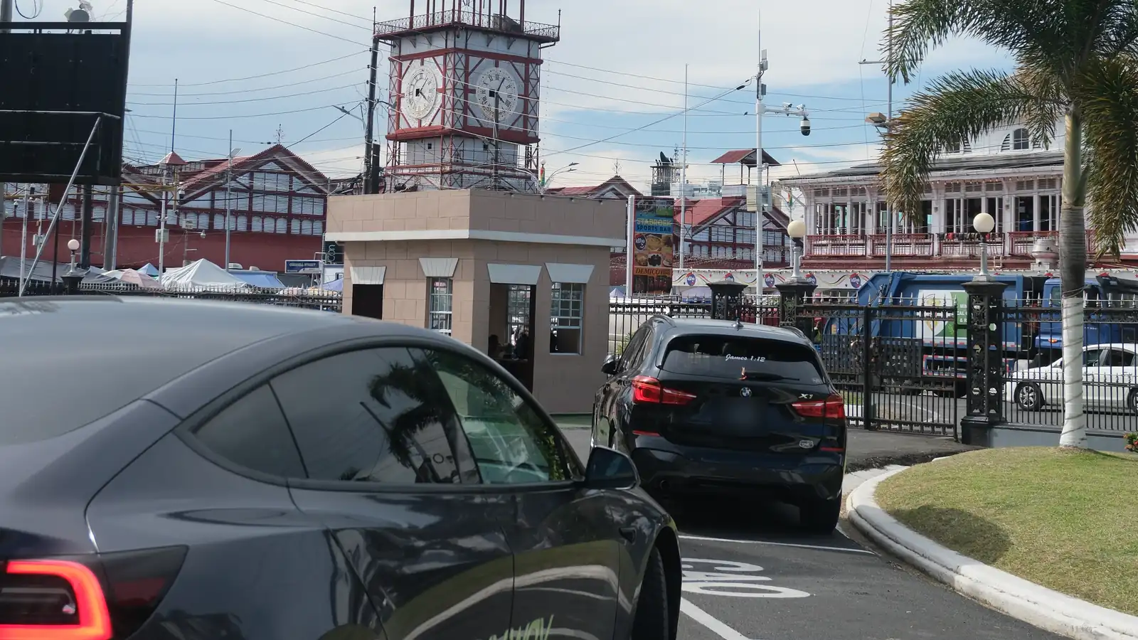 GuyWay Tesla near the Stabroek Market clock tower, Georgetown