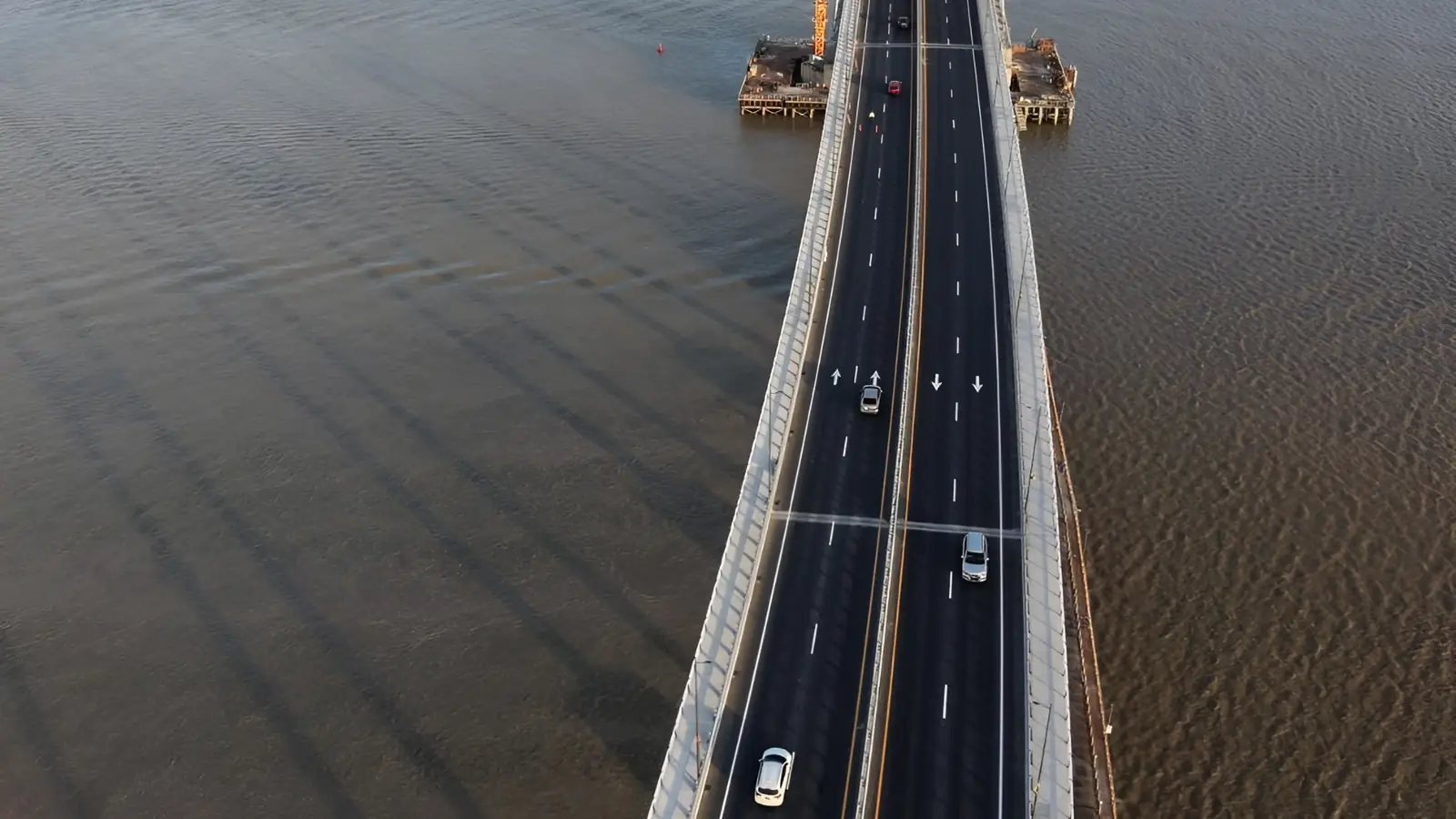 Aerial view of traffic at the new Demerara Harbour Bridge under construction